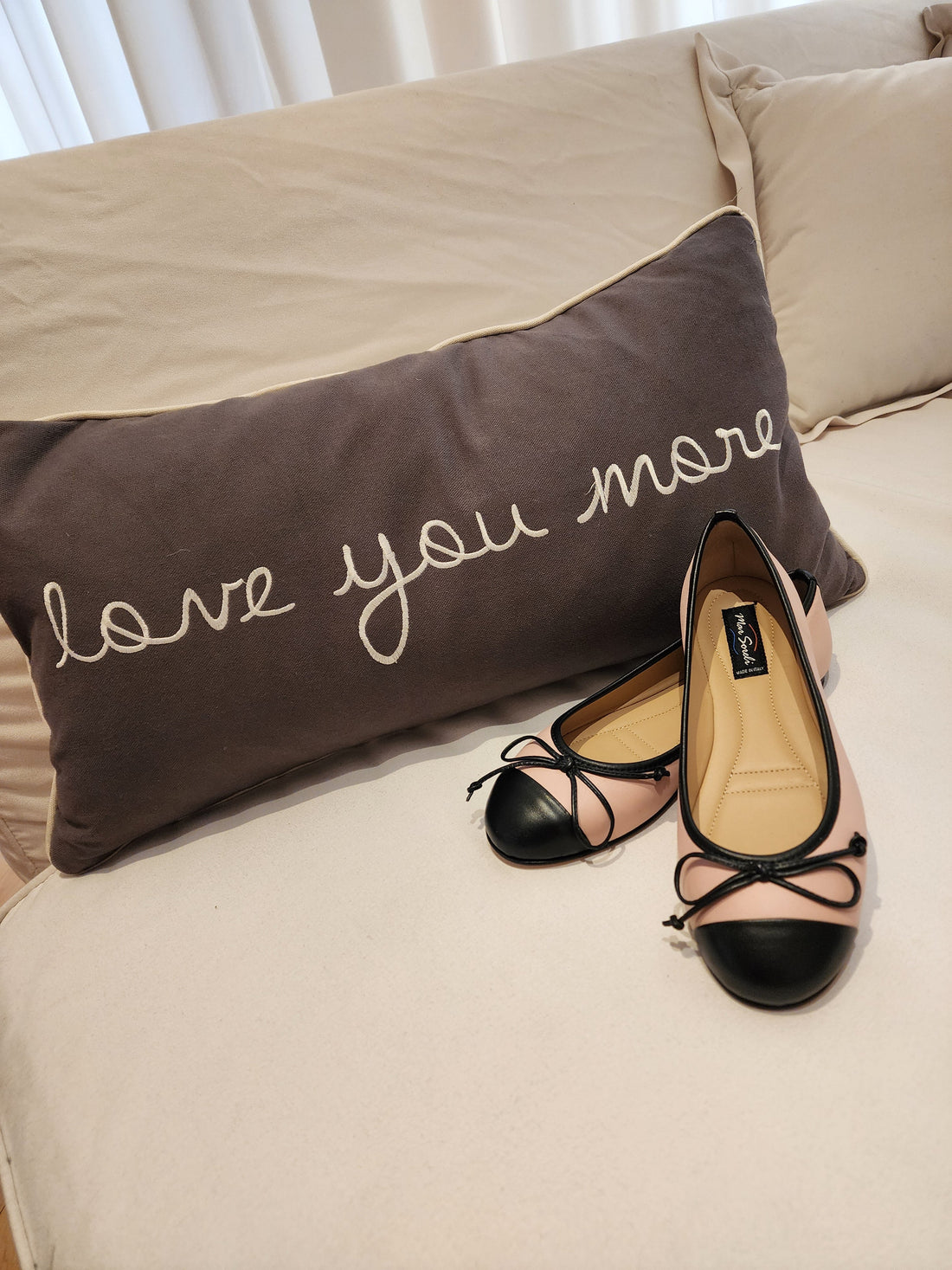 Step into Elegance: The Enduring Charm of the Two-Tone Ballet Flat