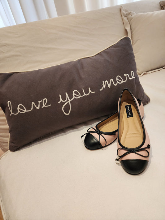 Step into Elegance: The Enduring Charm of the Two-Tone Ballet Flat